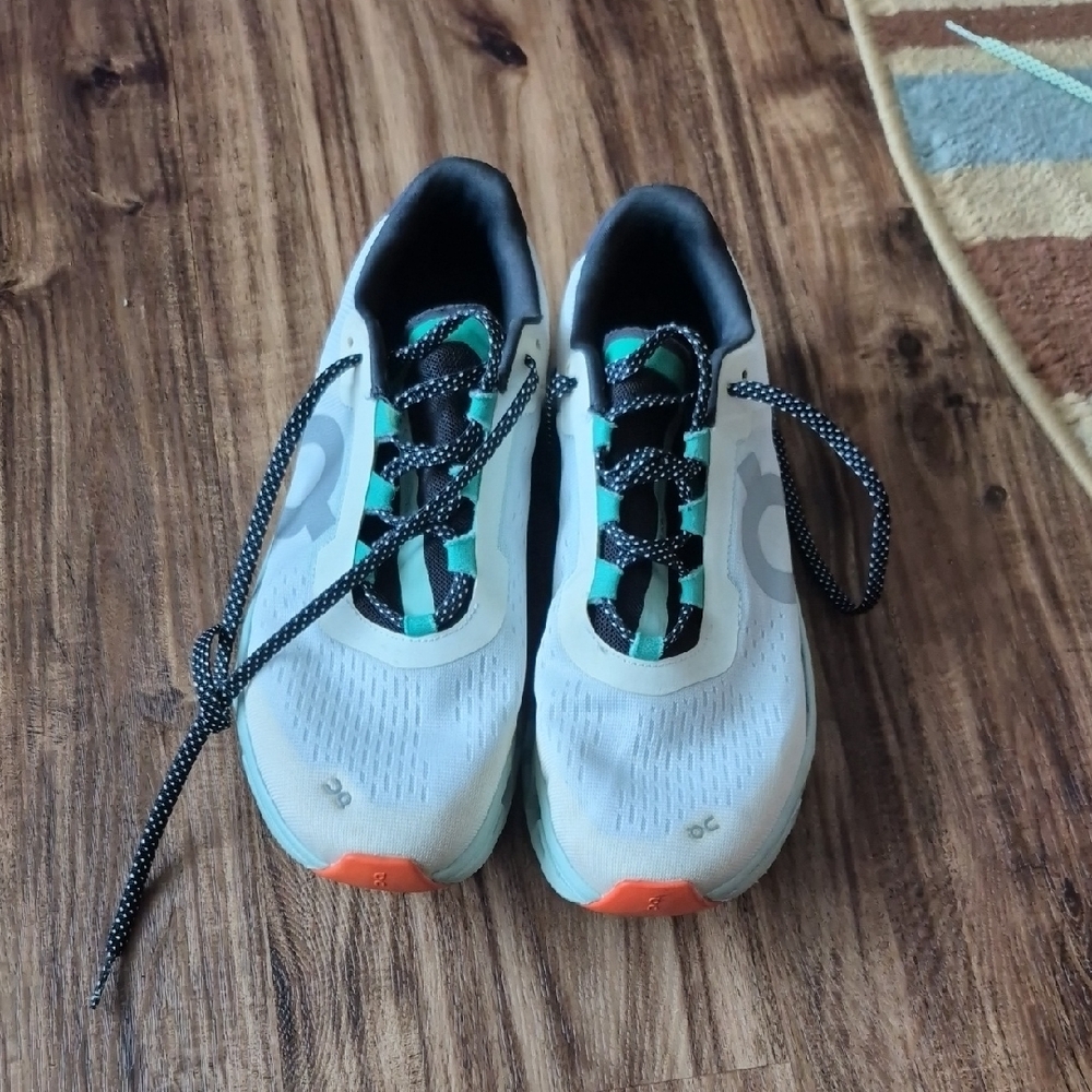 On Running Athletic Shoes in Cream and Orange